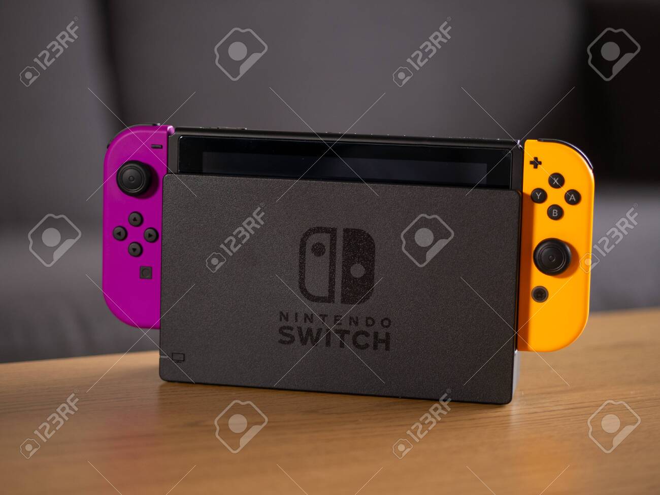 orange and purple video game console