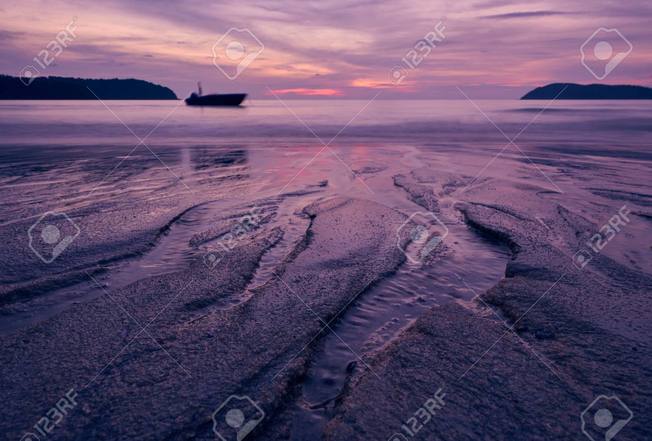Sunset Over Pantai Cenang Beach With Pink Colours Blur Background