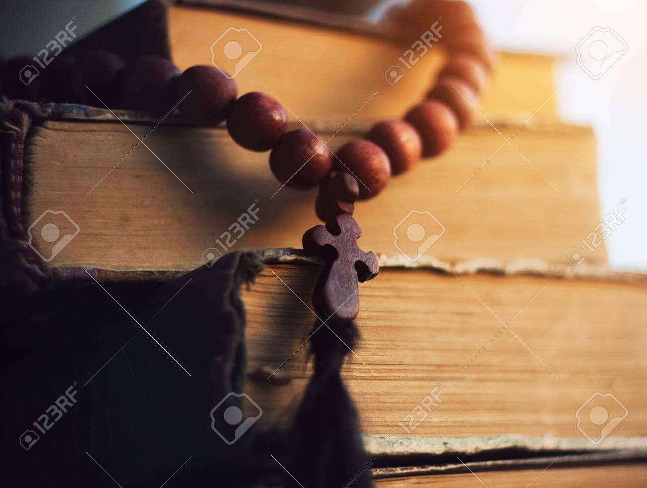Beautiful Rosary Of Mahogany With A Cross Lie On The Ancient Stock Photo Picture And Royalty Free Image Image 127920039