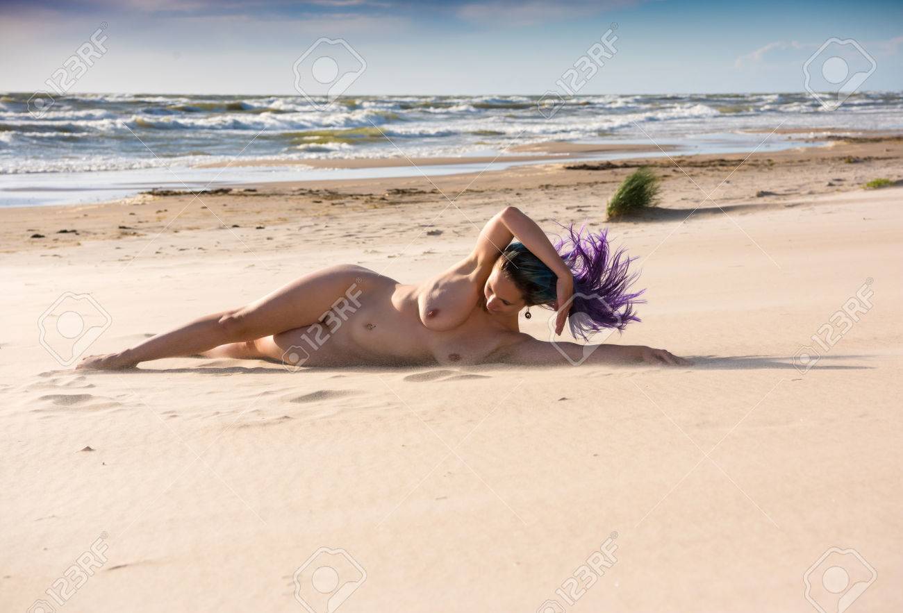 Young Nude Woman Posing On A Sandy Beach. Sexy Girl Enjoying Hot Summer Day  Outdoors Stock Photo, Picture and Royalty Free Image. Image 83736880.