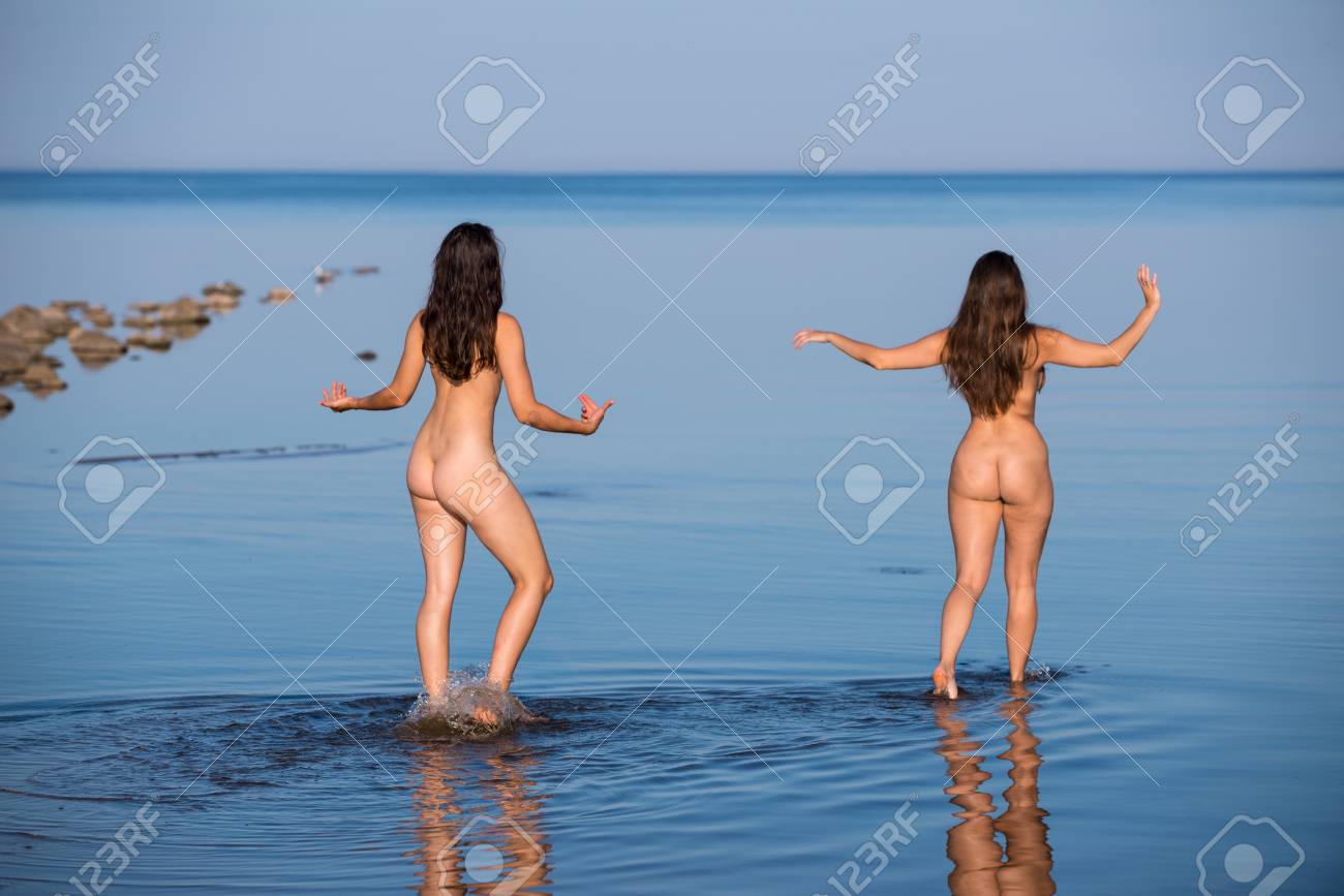 Nude woman relaxing on beach photo 834