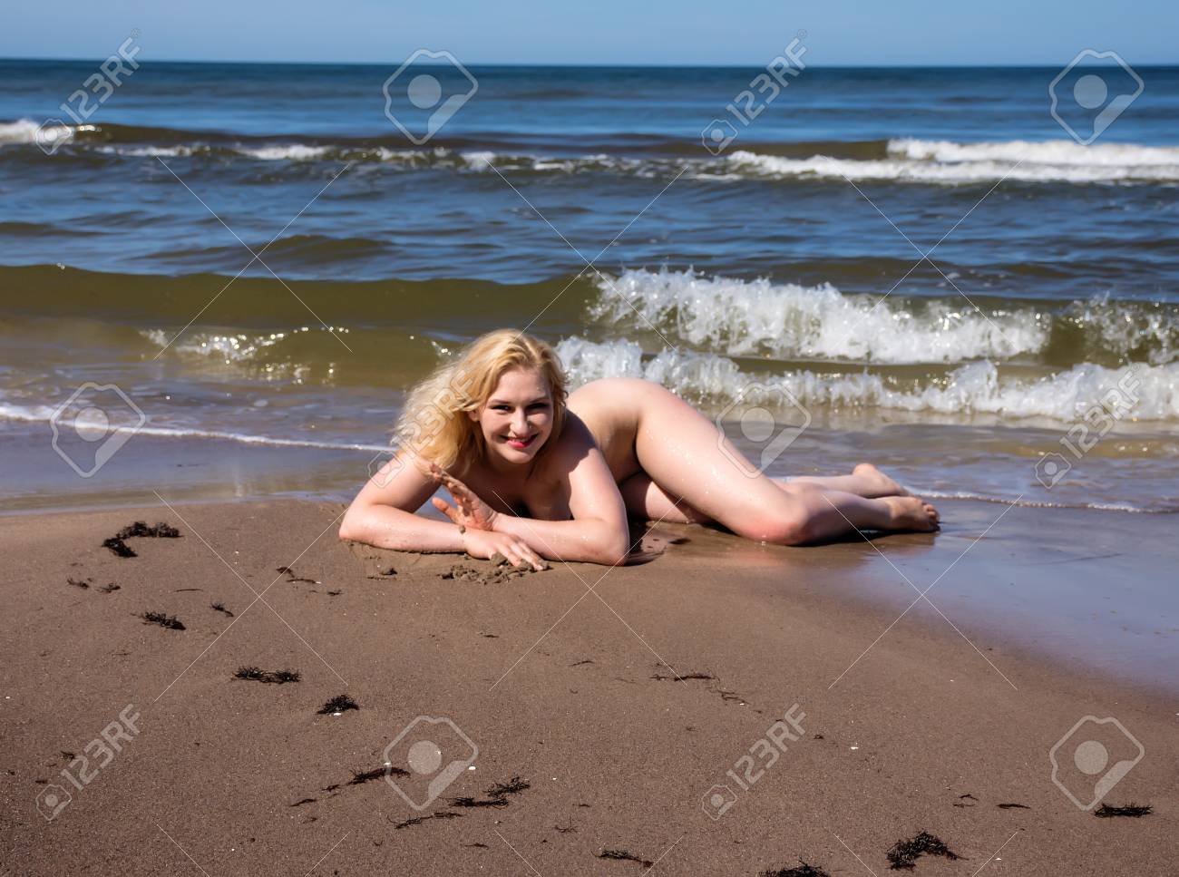 blond nudist Young Nude Woman Posing On A Sandy Beach. Sexy Blonde Enjoying Hot Summer  Day Outdoors Stock Photo, Picture and Royalty Free Image. Image 107851621.