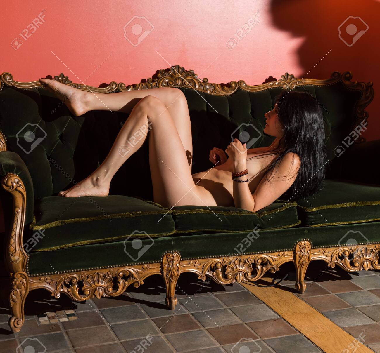 Gorgeous Naked Brunette Posing Indoors