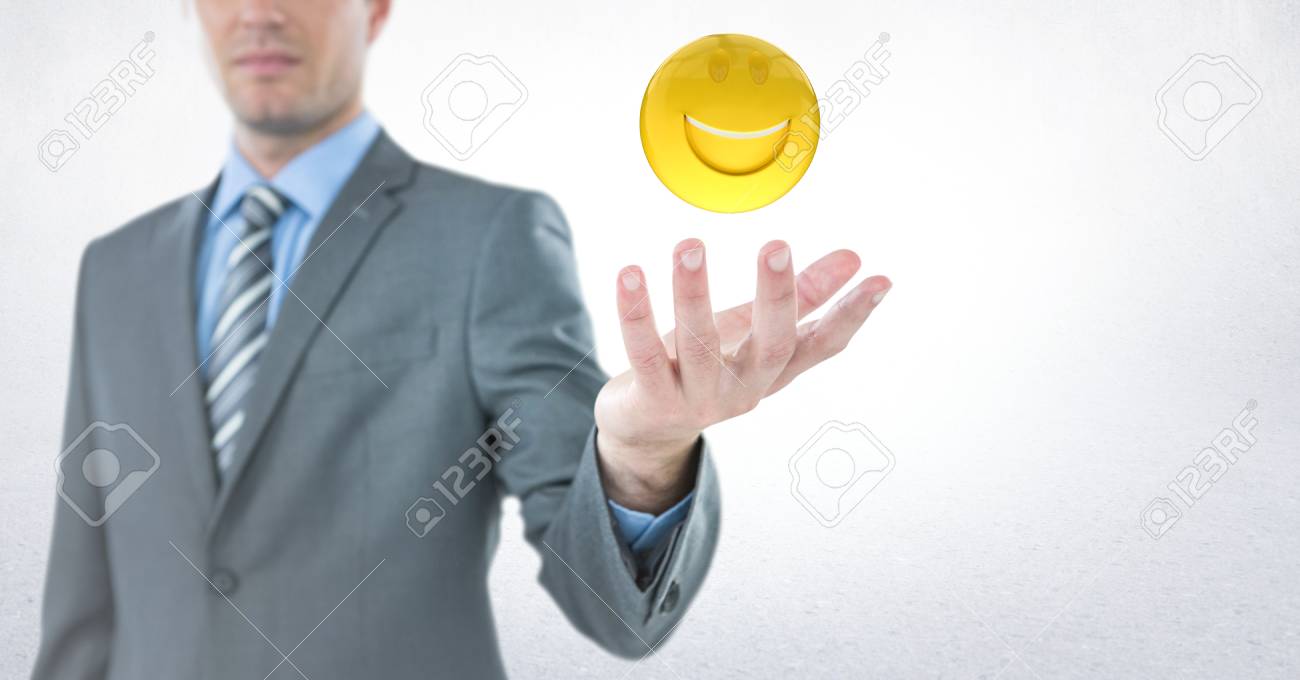 Digital Composite Of Business Man With Hand Out And Emoji With Flare Against White Background Stock Photo Picture And Royalty Free Image Image