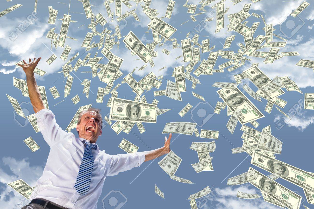 Digital composite of Excited business man with money rain against sky - 82481010 Digital composite of Excited business man with money rain against sky - 82481010