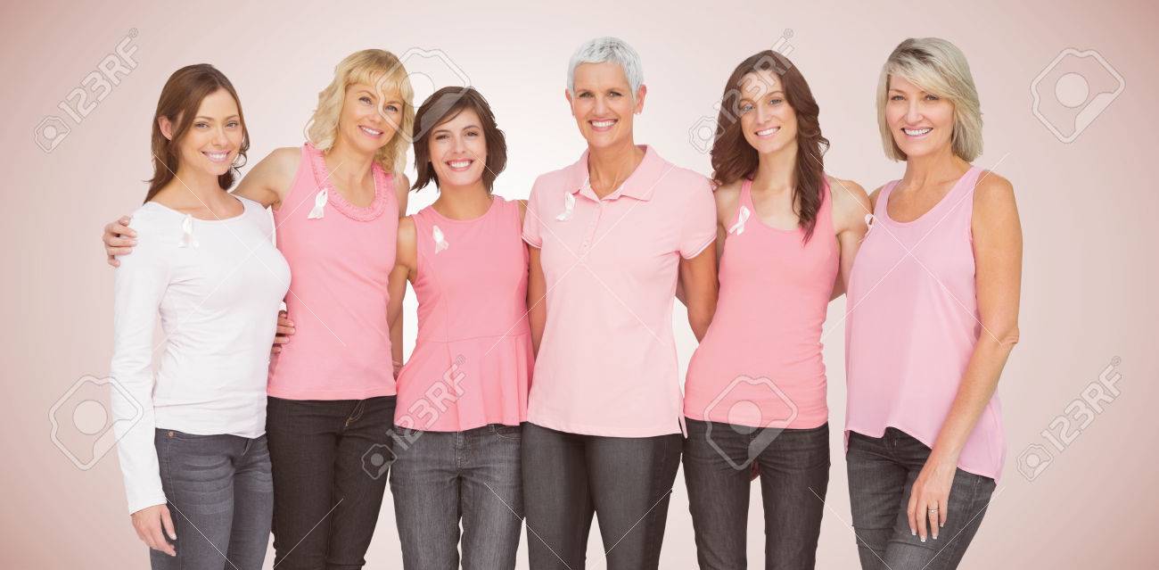 Portrait of smiling women supporting cancer social issue against neutral background - 85783091 Portrait of smiling women supporting cancer social issue against neutral background - 85783091