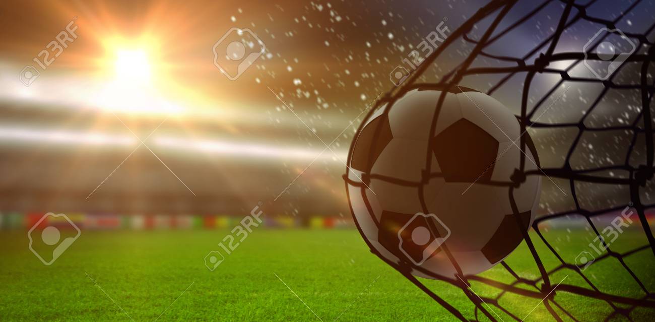 Football Hitting The Back Of The Net Against Soccer Stadium Stock Photo, Picture And Royalty Free Image. Image 114940619.
