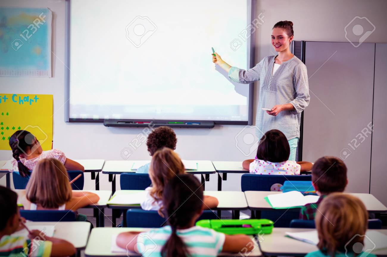 Teacher Teaching Children Using Projector In Classroom At School Stock Photo Picture And Royalty Free Image Image 119282205 Teacher Teaching Children Using Projector In Classroom At School Stock Photo Picture And Royalty Free Image Image 119282205