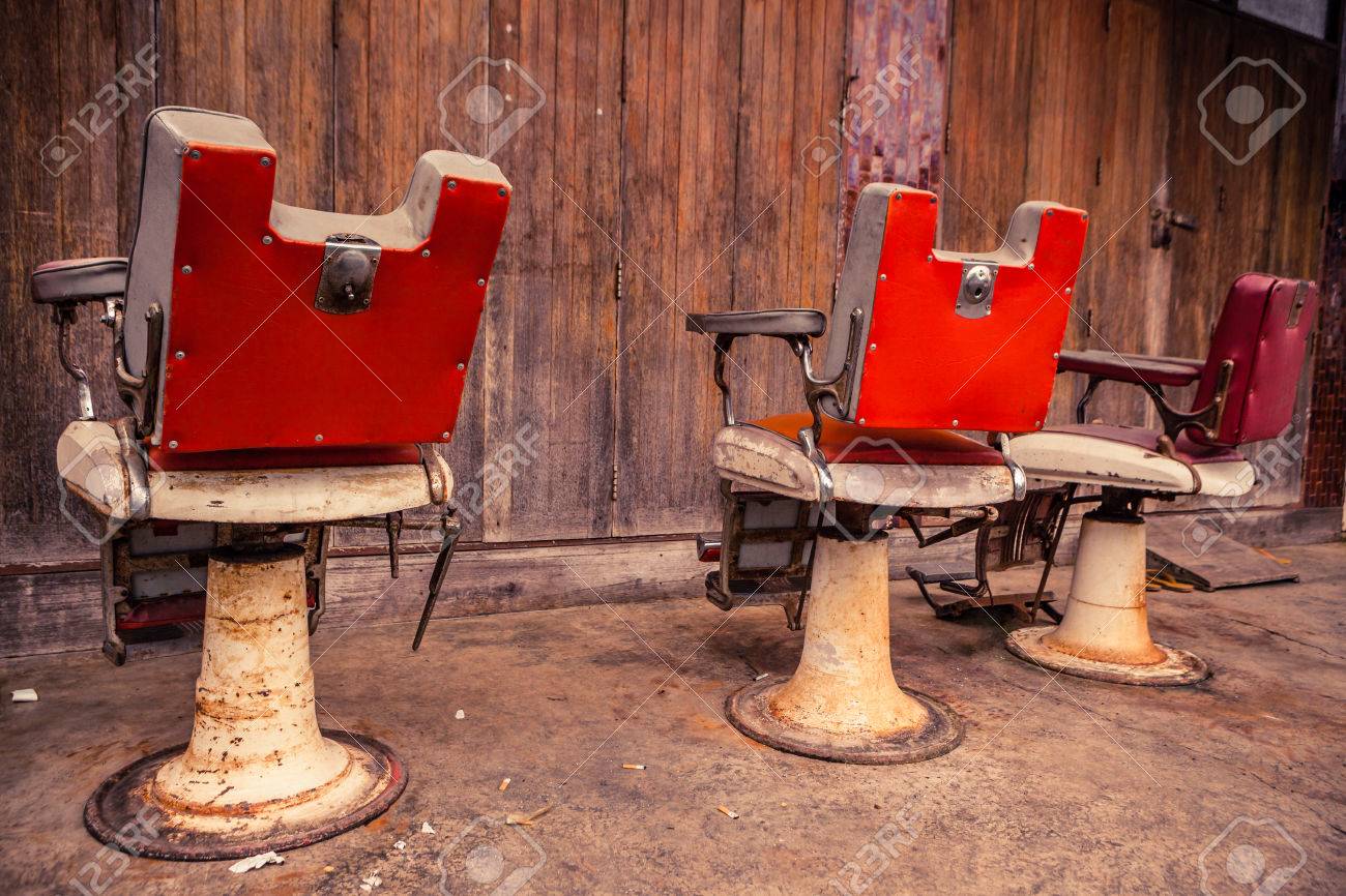 Old Barber Chairs >> Group Of Old Barber Chairs On Wooden Background Stock Photo Old Barber Chairs >> Group Of Old Barber Chairs On Wooden Background Stock Photo