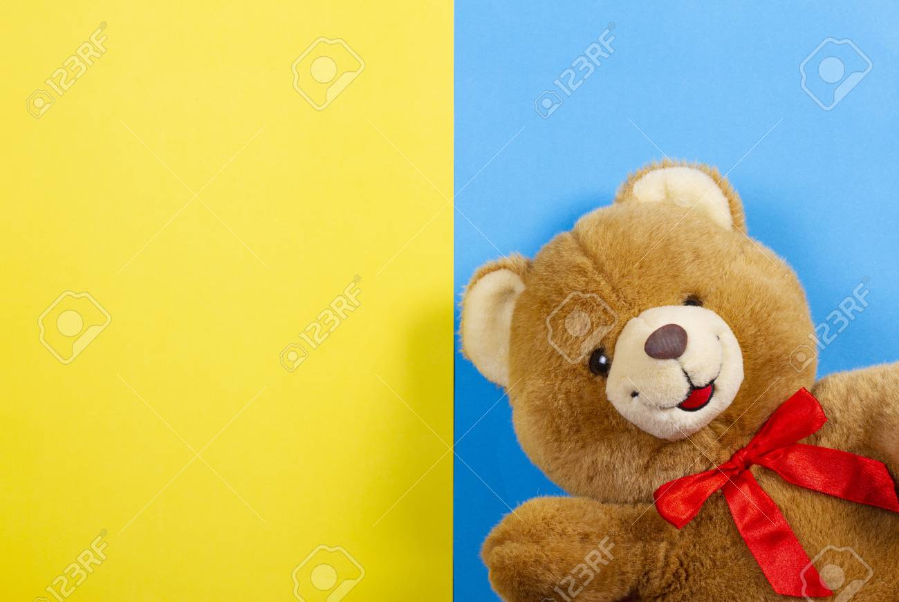 blue and yellow teddy bear