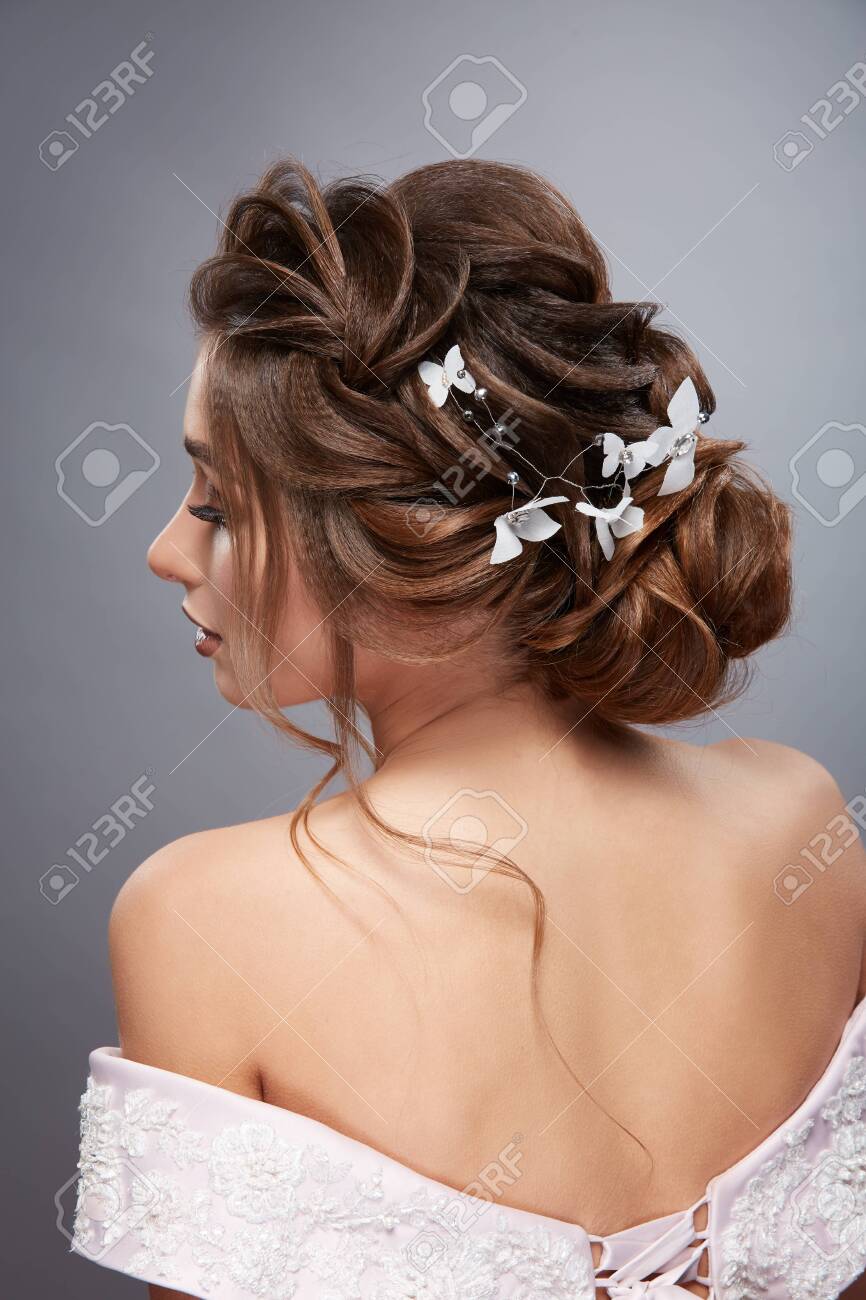 Back Of Womens Head Looking Sideways With Professional Hairstyle