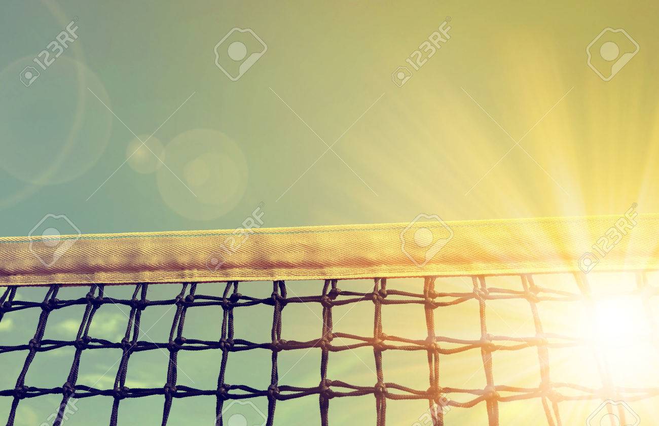 Tennis net with sunset sky in the background - 46298297 Tennis net with sunset sky in the background - 46298297