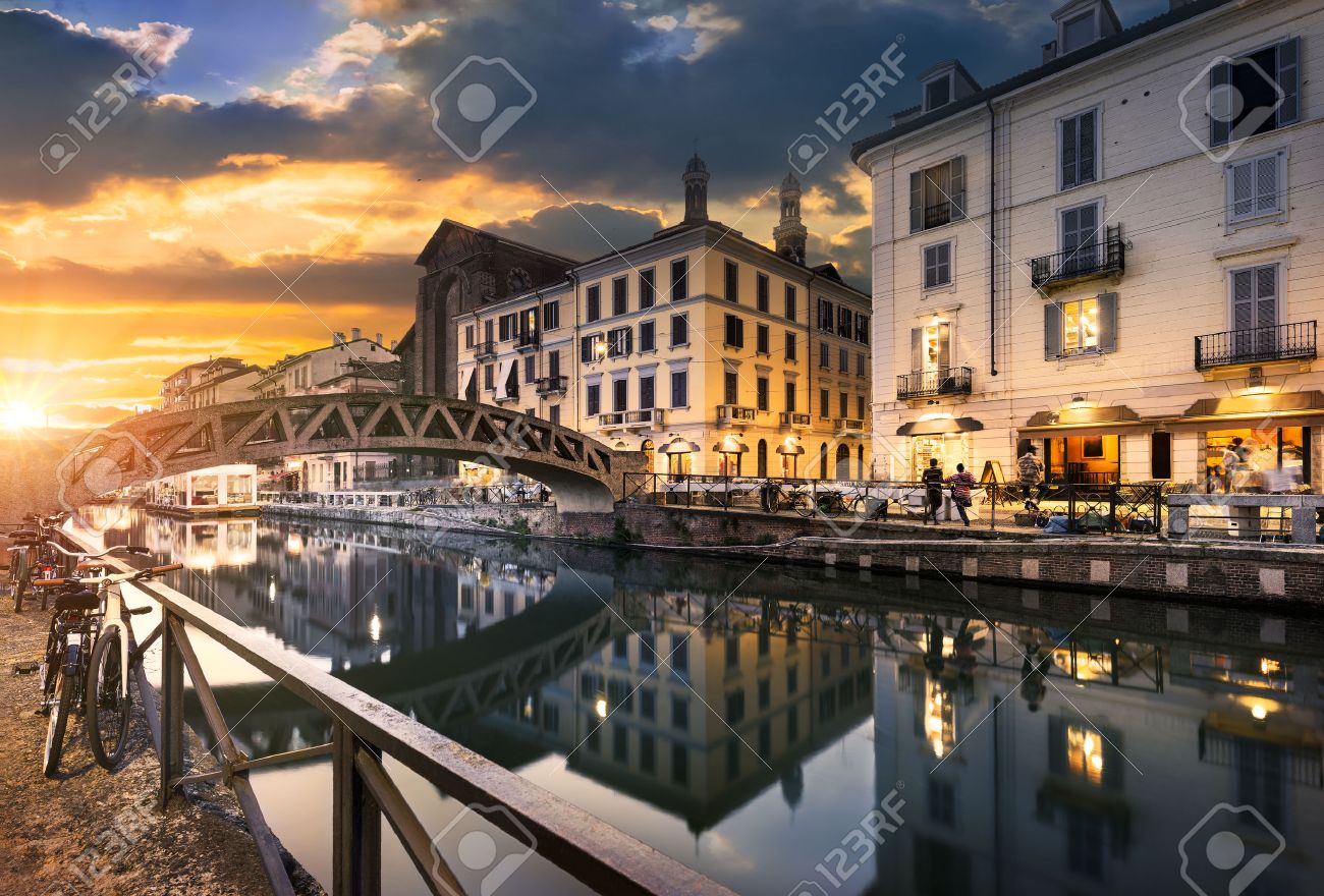 Bridge across the Naviglio Grande canal at the evening in Milan, Italy - 45203268 Bridge across the Naviglio Grande canal at the evening in Milan, Italy - 45203268