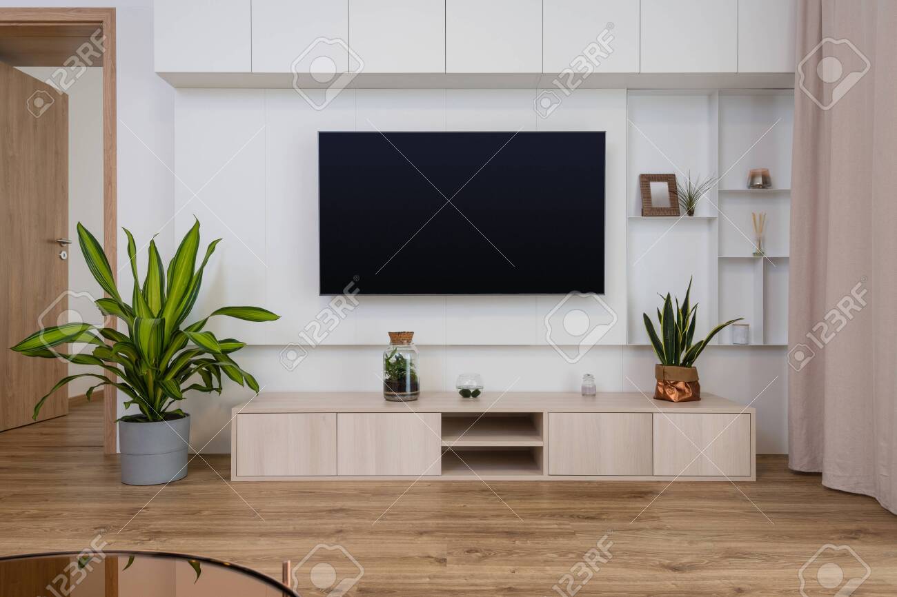 Interior Of Contemporary Living Room With Tv On The Wall Stock Photo Picture And Royalty Free Image Image 132309321