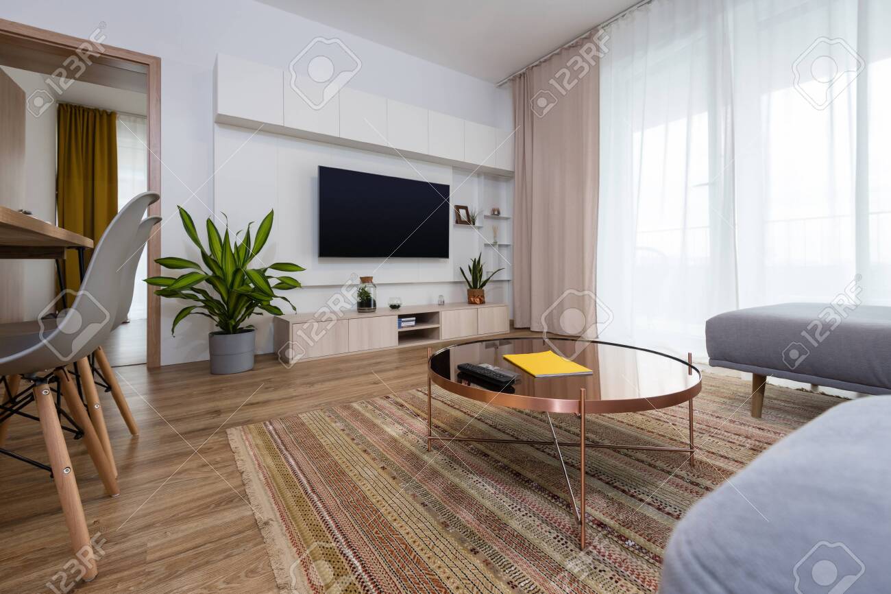 Interior Of Contemporary Living Room With Tv On The Wall Stock Photo Picture And Royalty Free Image Image 132308848
