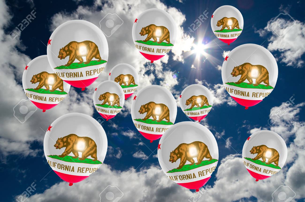 many ballons in colors of california flag flying on sky stock photo