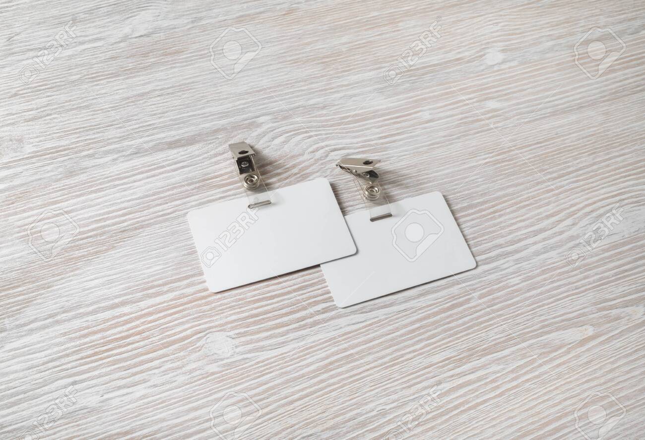 Download Photo Of Two Blank Plastic Badges Mockup On Light Wooden Background Stock Photo Picture And Royalty Free Image Image 122800058