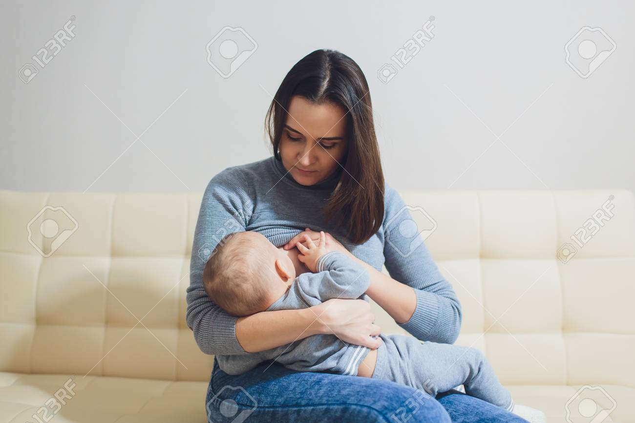 mother breastfeeding baby