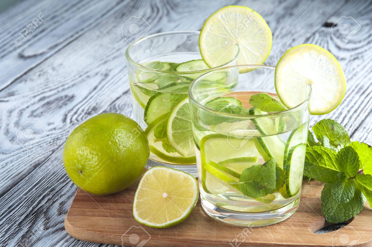 Cucumber Detox Water Lemon Lime And Mint Leaves On Wooden Table Stock Photo Picture And Royalty Free Image Image 55595661