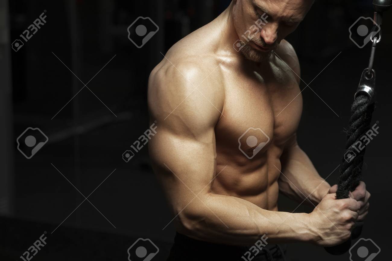 Fitness model posing naked