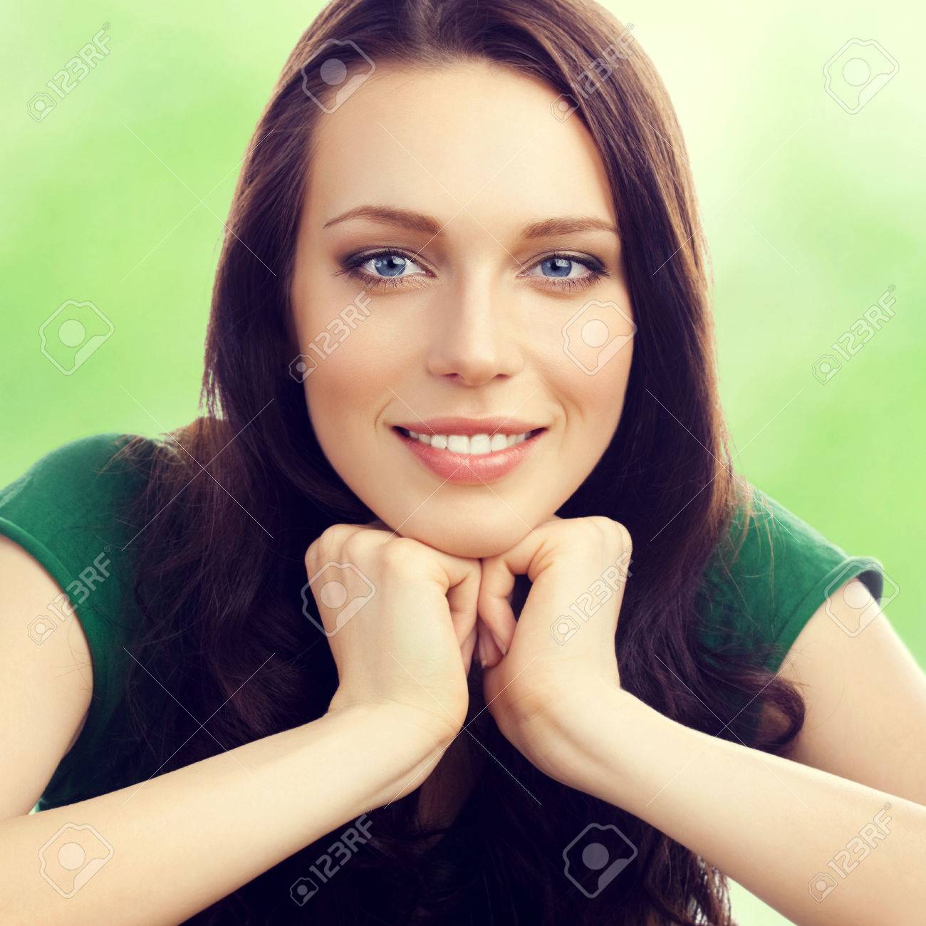 Portrait of cheerful smiling beautiful young brunette woman, outdoor - 42478365 Portrait of cheerful smiling beautiful young brunette woman, outdoor - 42478365