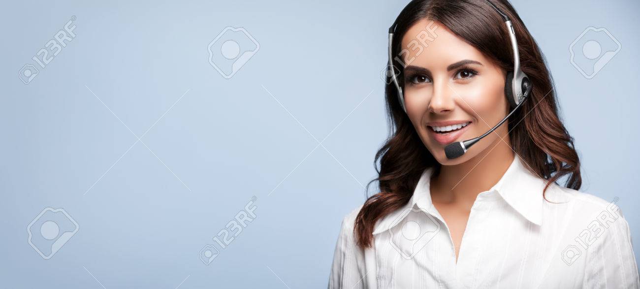 smiling customer support female phone operator in headset, against grey background. Consulting and assistance service call center. - 42486274 smiling customer support female phone operator in headset, against grey background. Consulting and assistance service call center. - 42486274