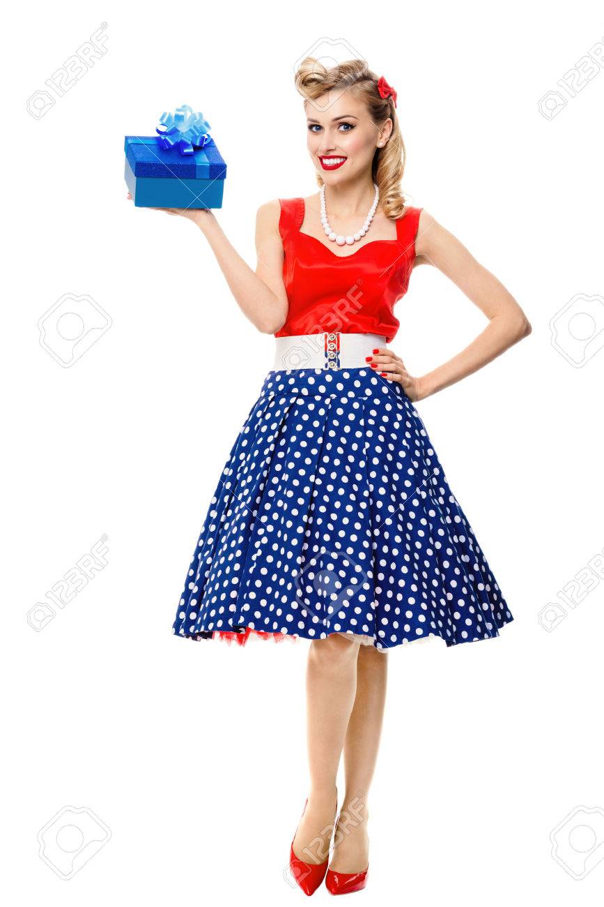 Full body portrait of beautiful young happy smiling woman dressed in pin-up style dress with polka dot, isolated over white background. Caucasian blond model posing in retro fashion and vintage concept studio shoot. - 51372634 Full body portrait of beautiful young happy smiling woman dressed in pin-up style dress with polka dot, isolated over white background. Caucasian blond model posing in retro fashion and vintage concept studio shoot. - 51372634
