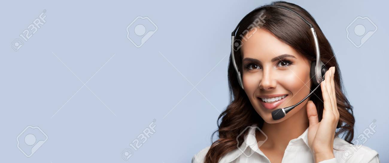 Portrait of support female phone operator in headset, with blank copyspace area for slogan or text message, on grey background. Consulting and assistance service call center. - 61283750 Portrait of support female phone operator in headset, with blank copyspace area for slogan or text message, on grey background. Consulting and assistance service call center. - 61283750