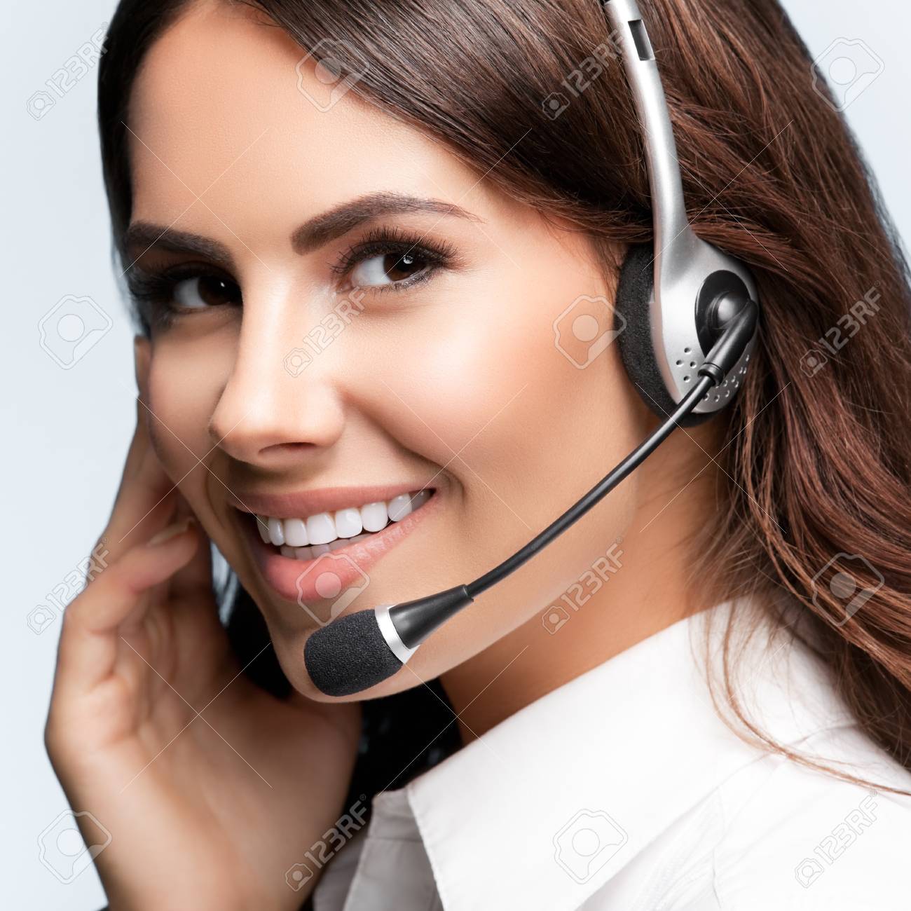 customer support phone operator in headset, against grey background. Consulting and assistance service call center. - 75498499 customer support phone operator in headset, against grey background. Consulting and assistance service call center. - 75498499