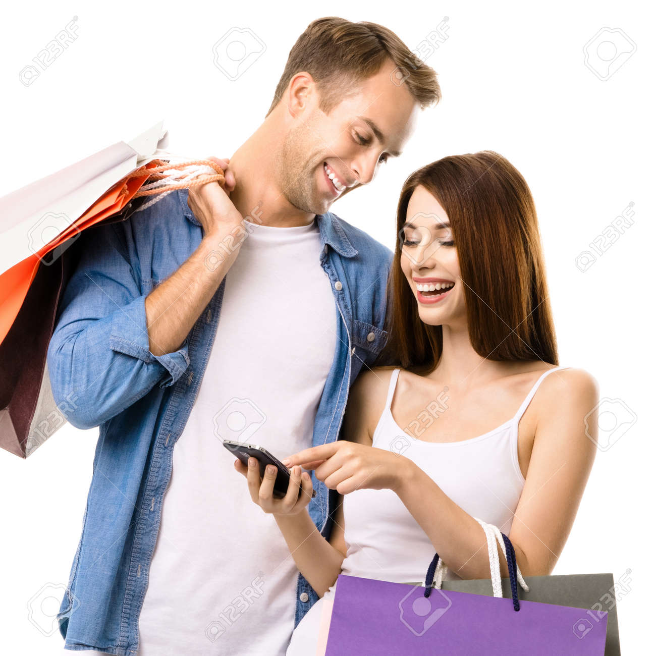 Happy smiling couple with shopping bags, and phone, standing close to each other. Love, holiday sales, shop, retail, discounts, consumer concept, isolated on white background. Square. - 171559980 Happy smiling couple with shopping bags, and phone, standing close to each other. Love, holiday sales, shop, retail, discounts, consumer concept, isolated on white background. Square. - 171559980