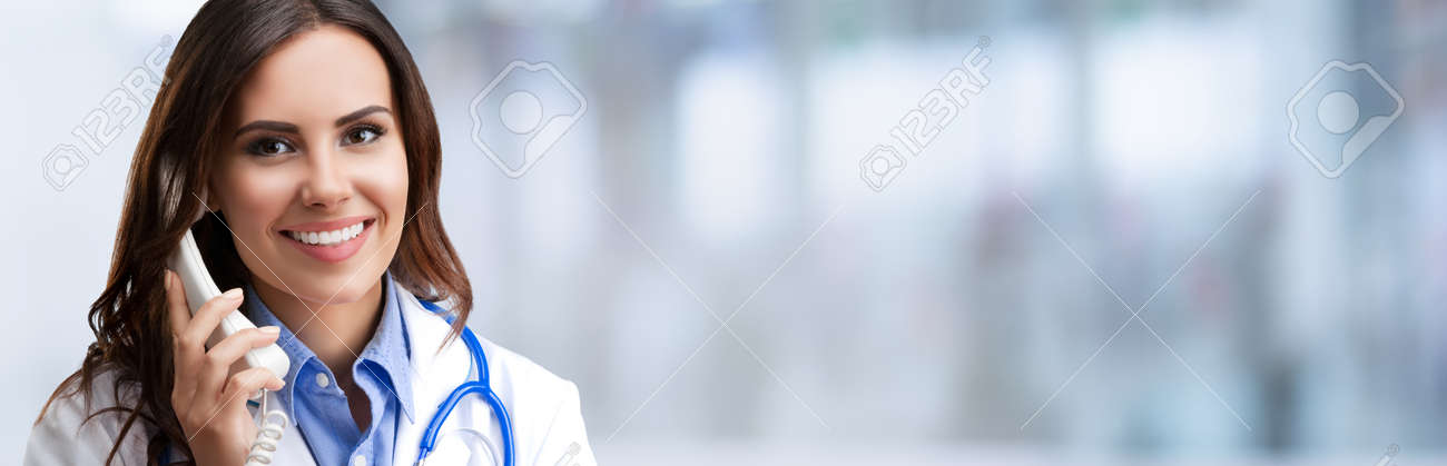 Portrait image of happy smiling female doctor on phone over grey background, on blurred modern office background. Medical help call center concept. - 171710503 Portrait image of happy smiling female doctor on phone over grey background, on blurred modern office background. Medical help call center concept. - 171710503