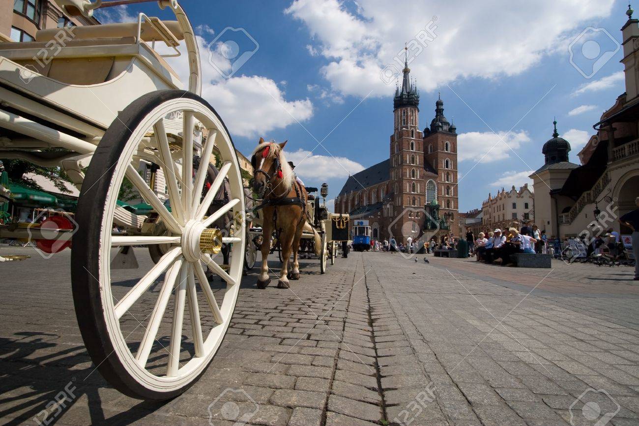 Beautiful summer view of Mariacki Church in Cracow, Poland - 1414802 Beautiful summer view of Mariacki Church in Cracow, Poland - 1414802