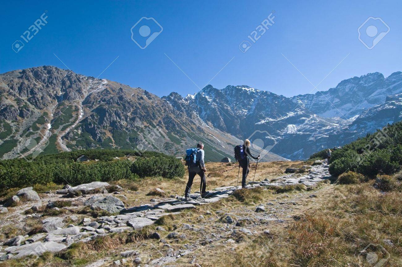 Couple trekking in Tatra Mountains during late autumn, Poland - 2291461 Couple trekking in Tatra Mountains during late autumn, Poland - 2291461