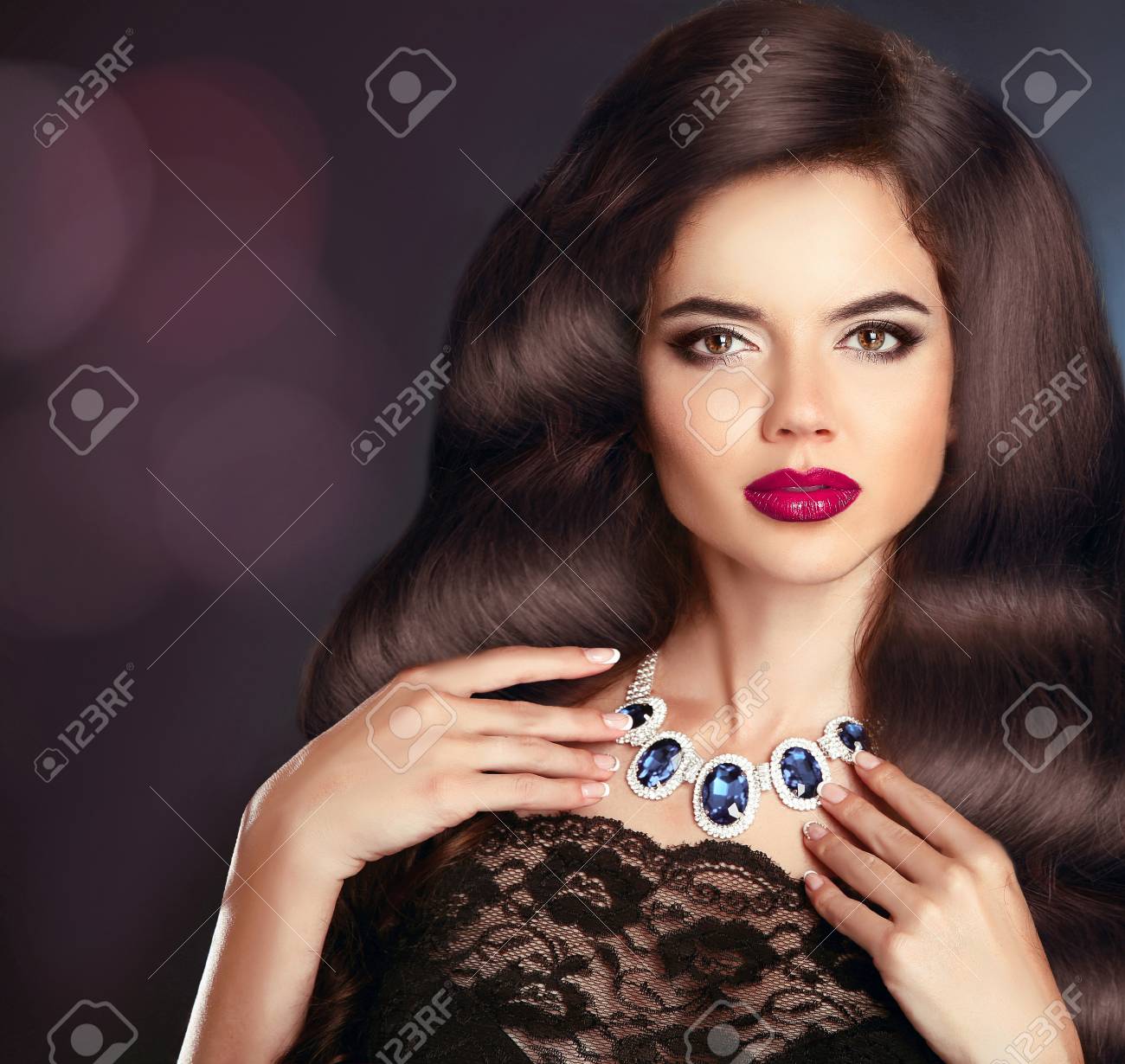 Makeup Jewelry Hairstyle Brunette Woman With Long Curly Hair