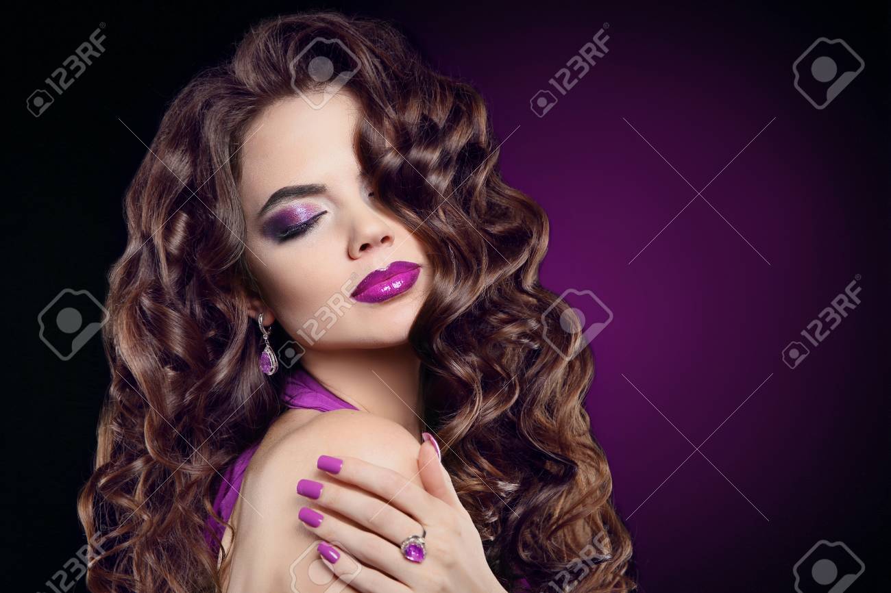 Brunette With Long Curly Hair Violet Makeup Manicure Nails