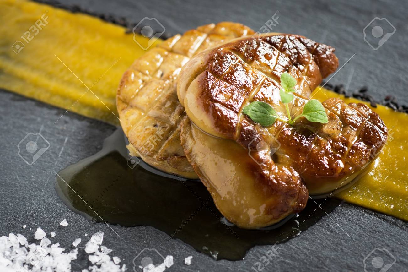 Fried Goose Liver Foie Gras With Mango Puree Stock Photo Picture And Royalty Free Image Image 99914781