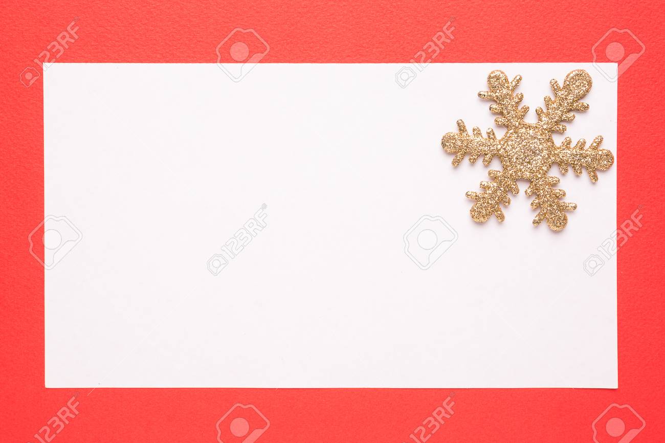blank christmas card or invitation with snowflake on red background