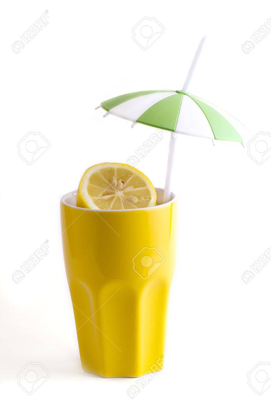 Download Slices Of Lemon In Yellow Ceramic Cup With A Straw And Umbrella Stock Photo Picture And Royalty Free Image Image 19165517 Yellowimages Mockups