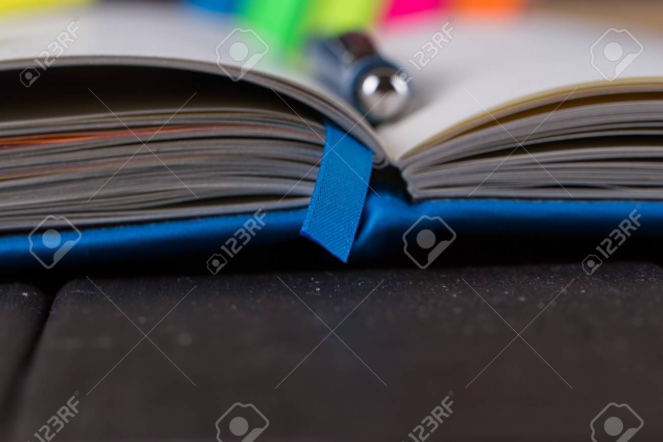 planning your day a day blank day planner with a blue pen stock blank day planner