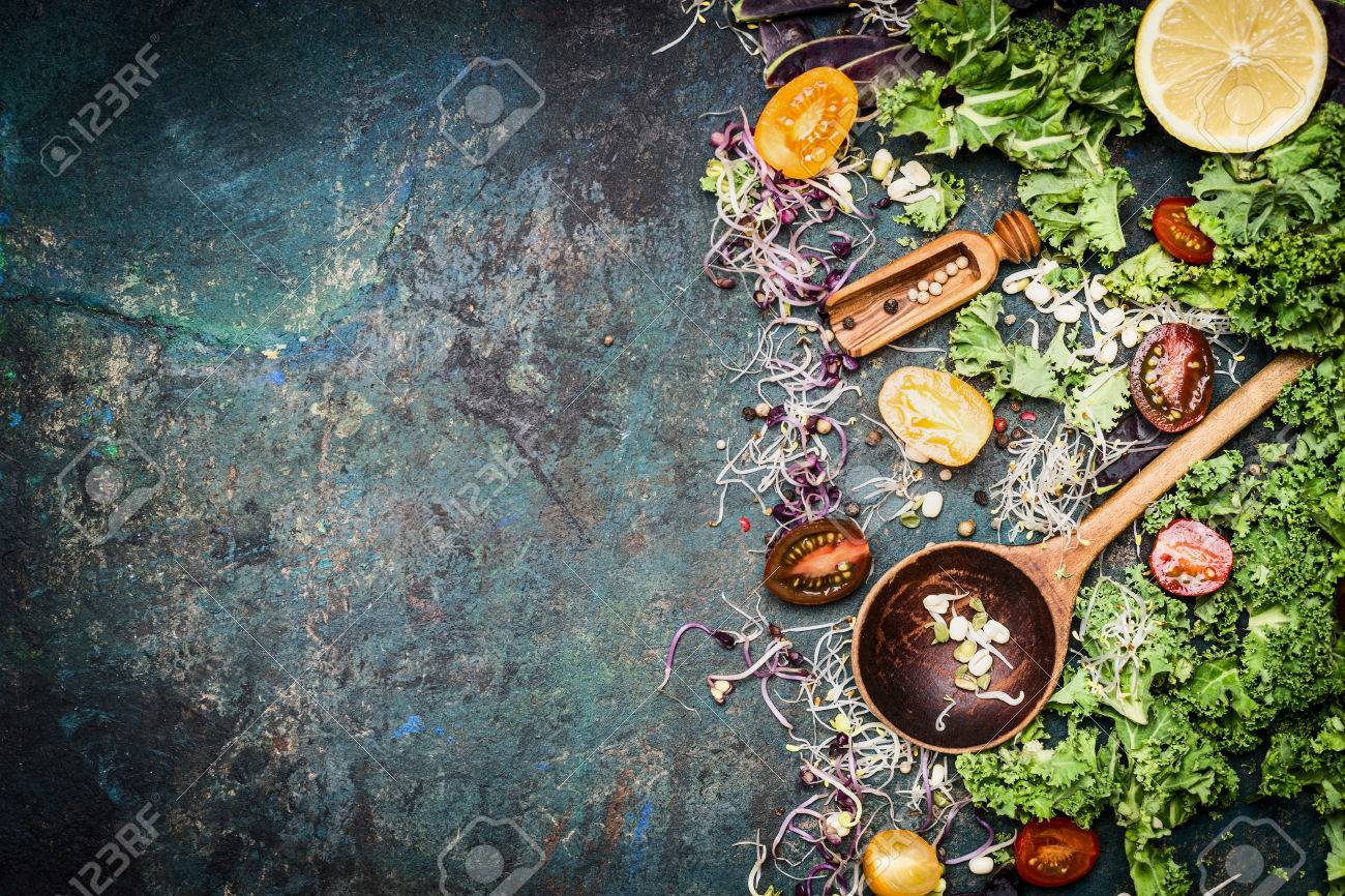Fresh vegetables cooking ingredients with kale , lemon and tomatoes on rustic background, top view, border. Healthy food or diet nutrition concept - 50916467 Fresh vegetables cooking ingredients with kale , lemon and tomatoes on rustic background, top view, border. Healthy food or diet nutrition concept - 50916467