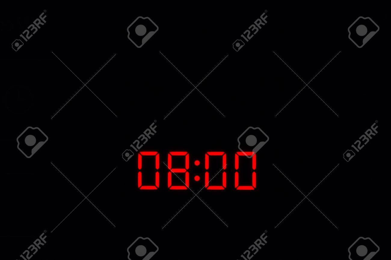 黒の背景に赤い照明で 8:00 電子タイム レコーダーの写真素材・画像素材 Image 48512388
