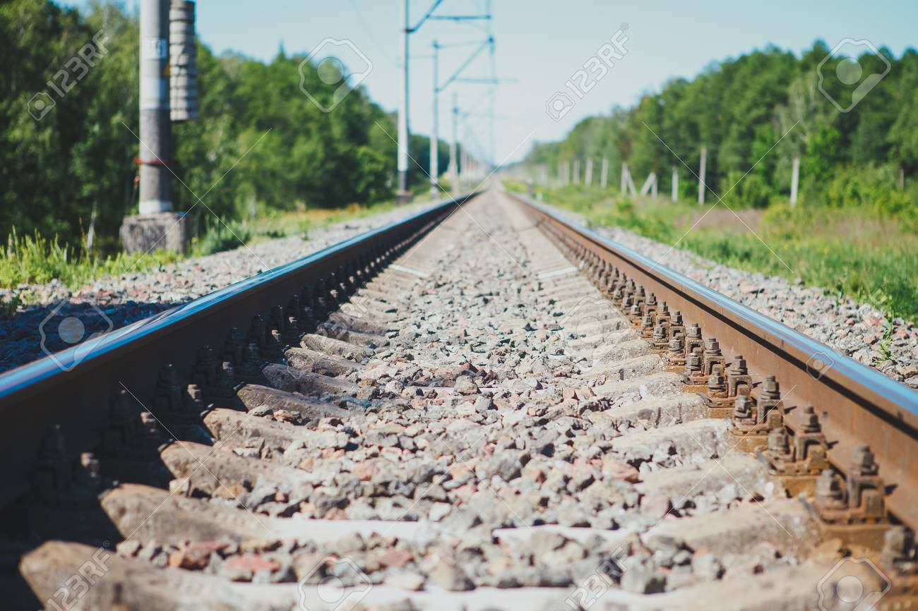 Railway Track To The Up Country. Railway Rail Close-up, Background,  Wallpaper. Stock Photo, Picture and Royalty Free Image. Image 81496168.