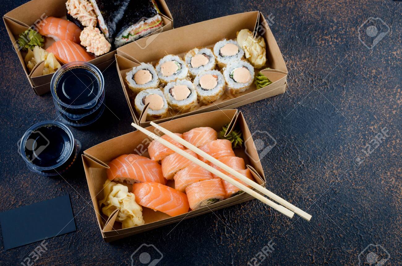 Download Tasty Sushi Rolls In Disposable Kraft Paper Boxes Sauces On Stock Photo Picture And Royalty Free Image Image 147915076