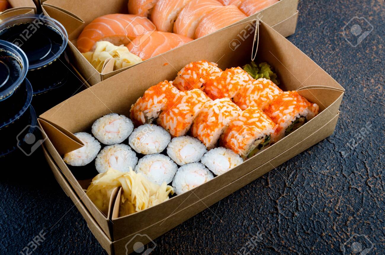 Download Tasty Sushi Rolls In Disposable Kraft Paper Boxes Sauces On Stock Photo Picture And Royalty Free Image Image 147915399