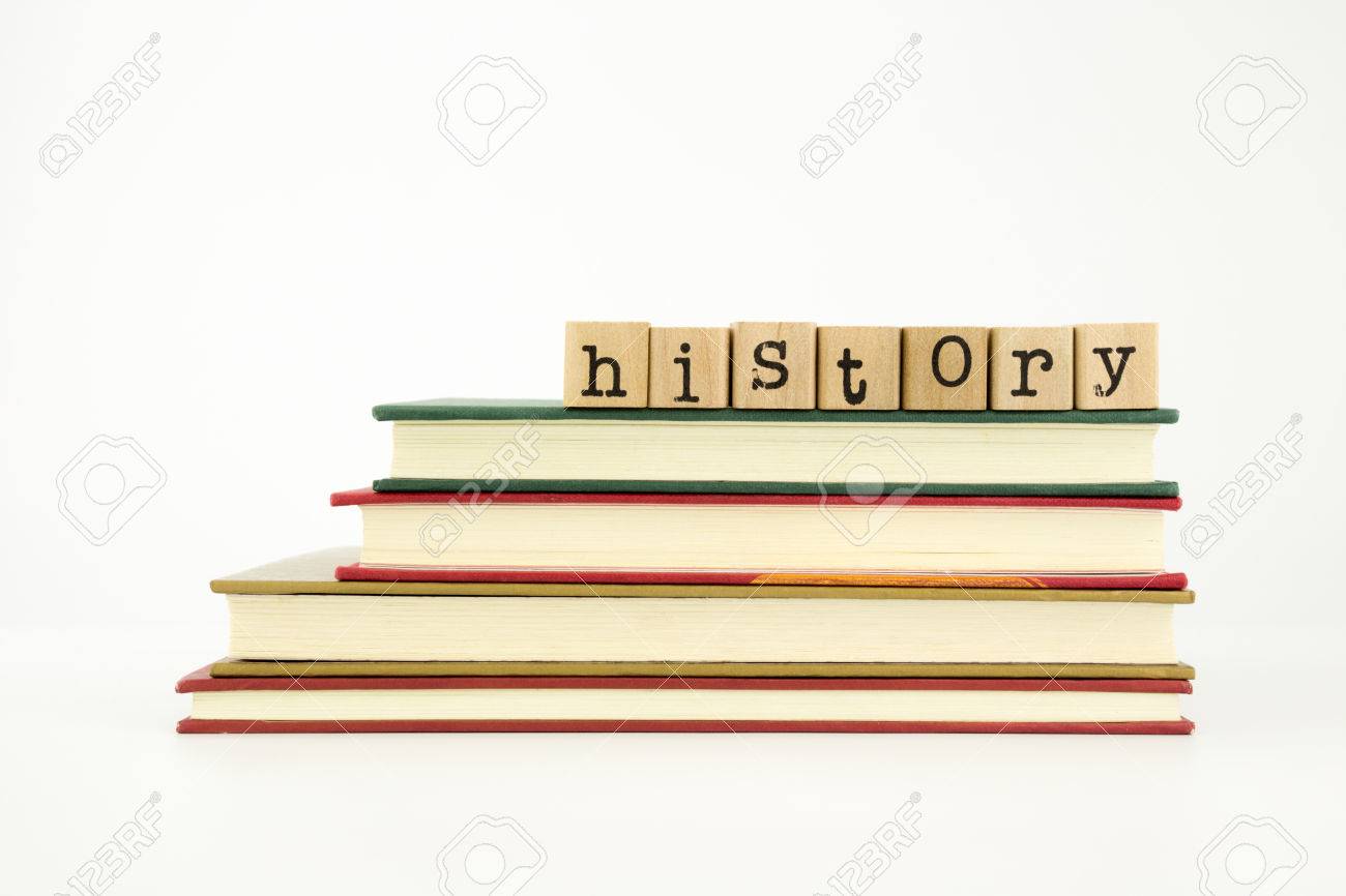 history word on wood stamps stack on books knowledge and academic