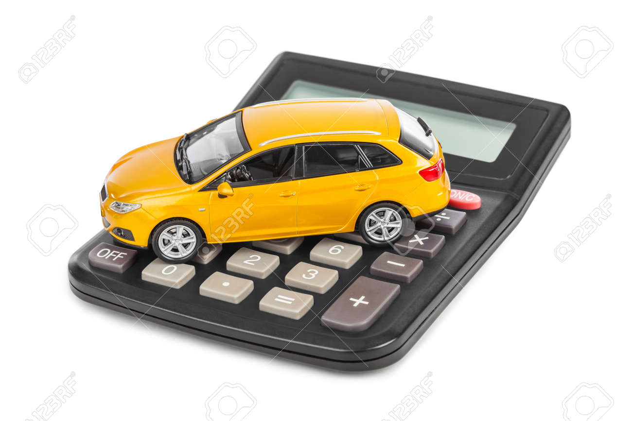 Calculator and toy car isolated on white background - 46120829 Calculator and toy car isolated on white background - 46120829