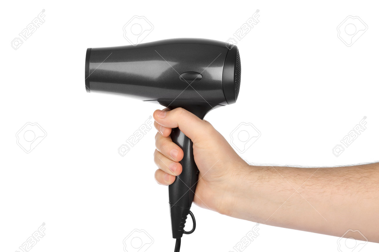 Hair dryer in hand isolated on white background - 65566864 Hair dryer in hand isolated on white background - 65566864