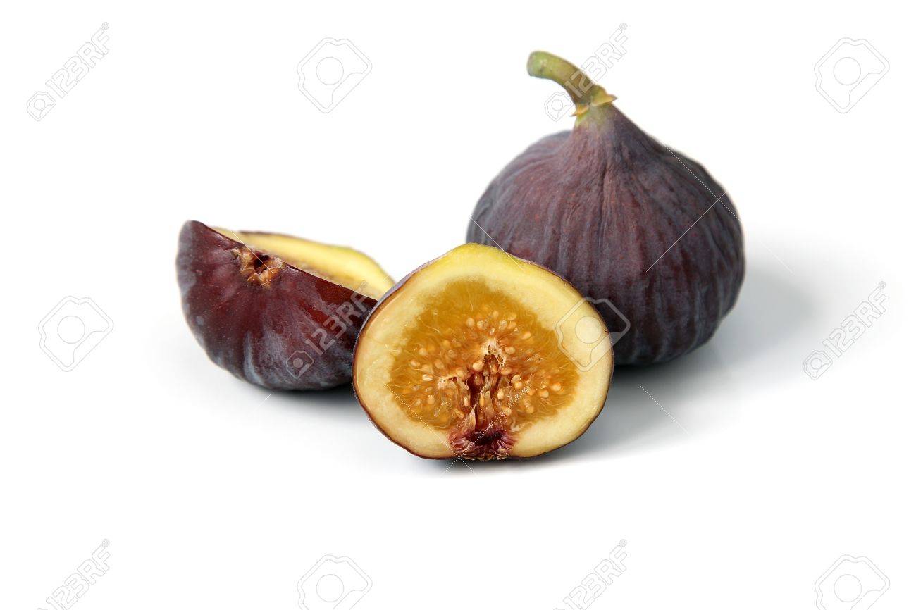Fresh Figs Cut Open Showing The Yellow Flesh And Seeds Inside On White Background Edible Fruit Food Stock Photo Picture And Royalty Free Image Image 77746325