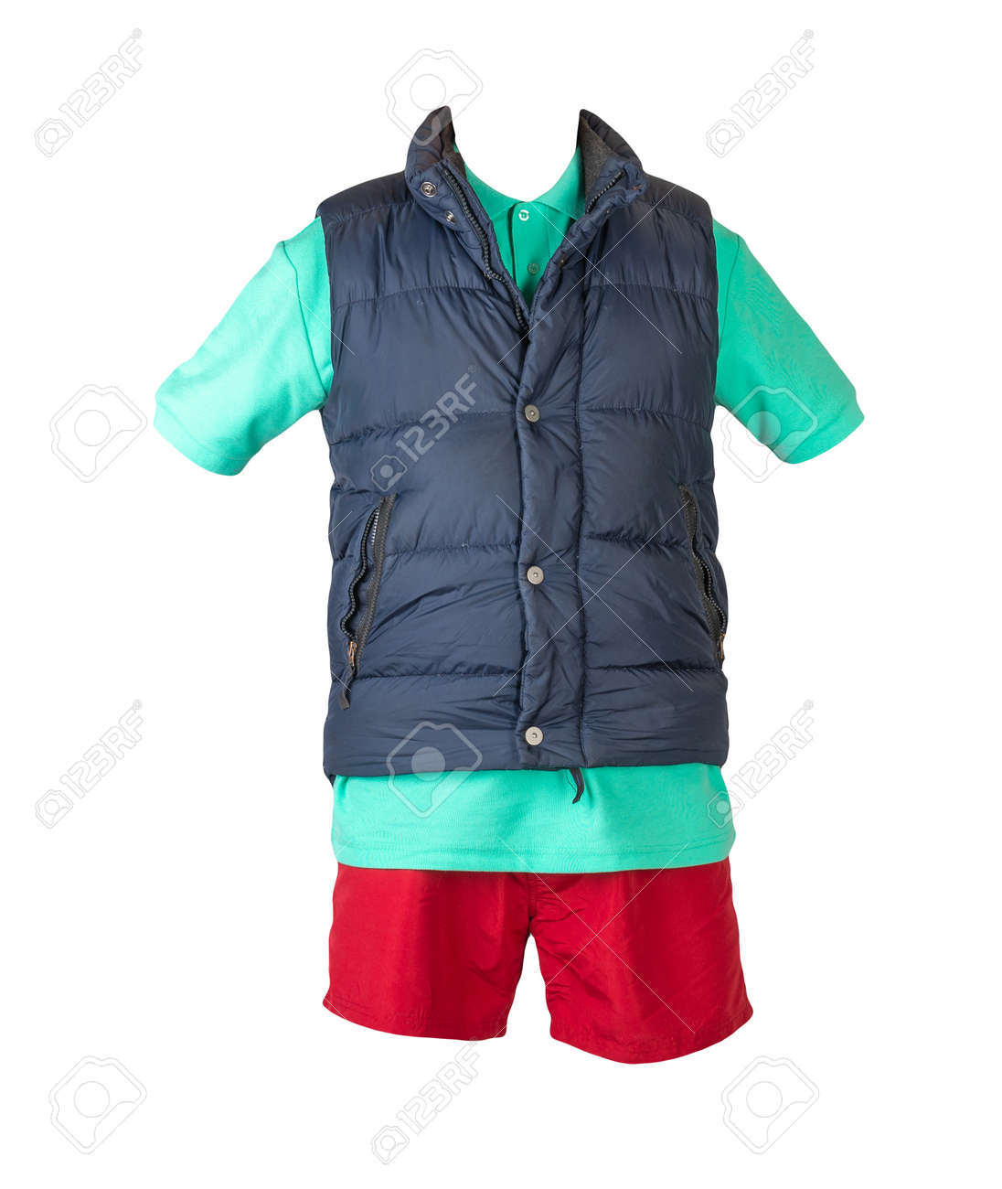 Dark blue sleeveless jacket, green t-shirt with collar on buttons and red sports shorts, isolated on white background. Current clothes for cool weather - 172140038 Dark blue sleeveless jacket, green t-shirt with collar on buttons and red sports shorts, isolated on white background. Current clothes for cool weather - 172140038