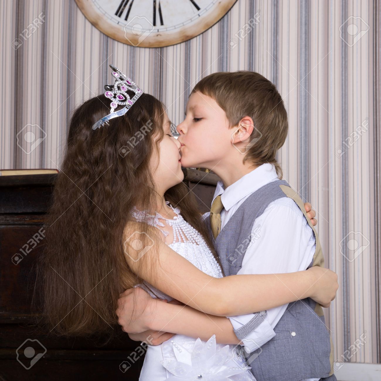 love concept couple of kids loving each other hugging and kissing